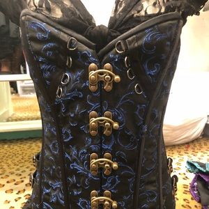 Small black and blue lace corset with brass accents